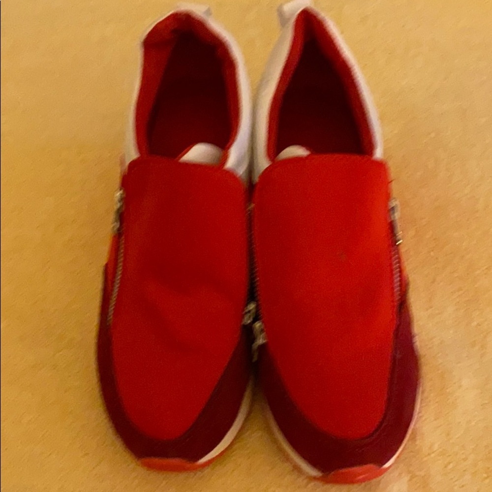 Red wedge high top tennis shoes